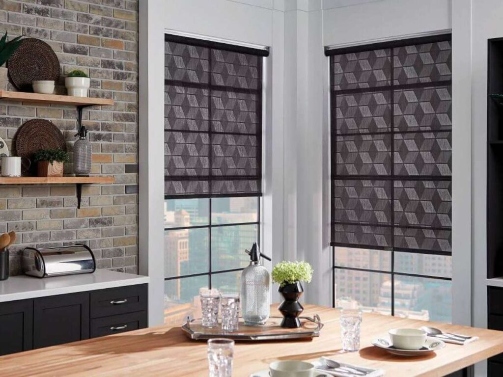 Graber Black Patterned Roller Shades in Dining Area