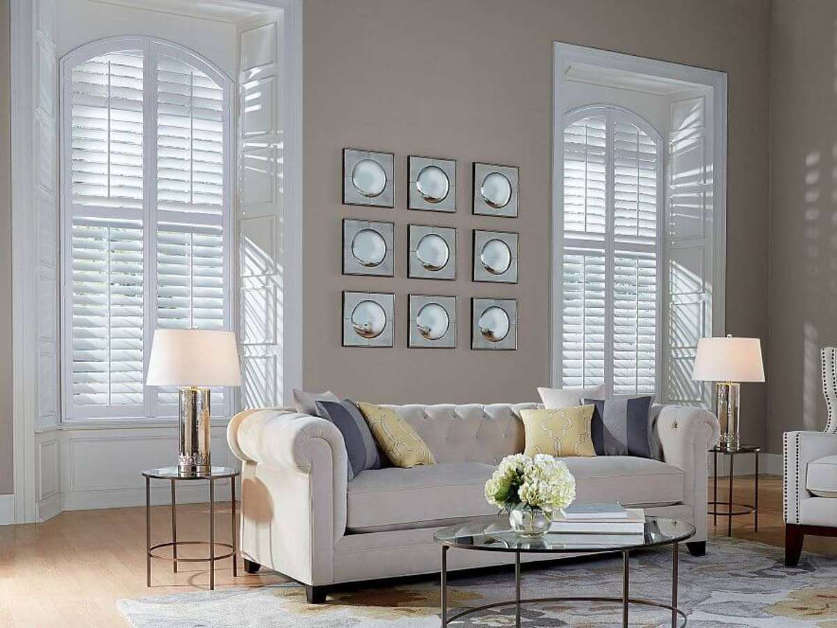 Graber White Arched Shutters in Living Room