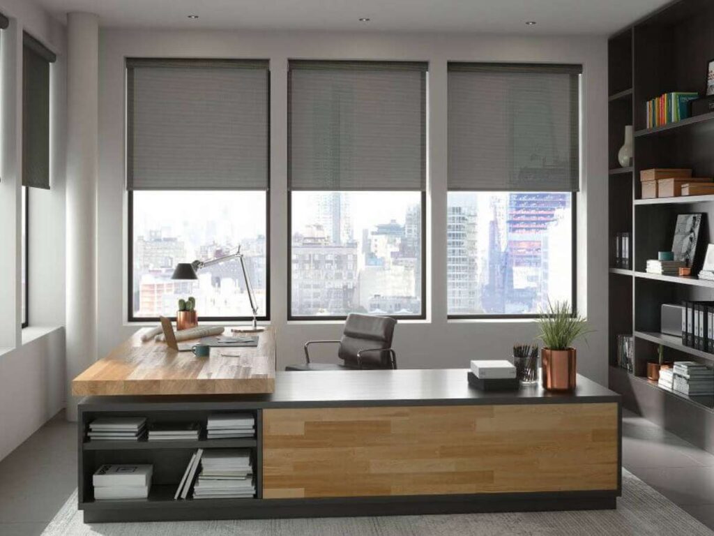 Modern office with large windows and solar shades