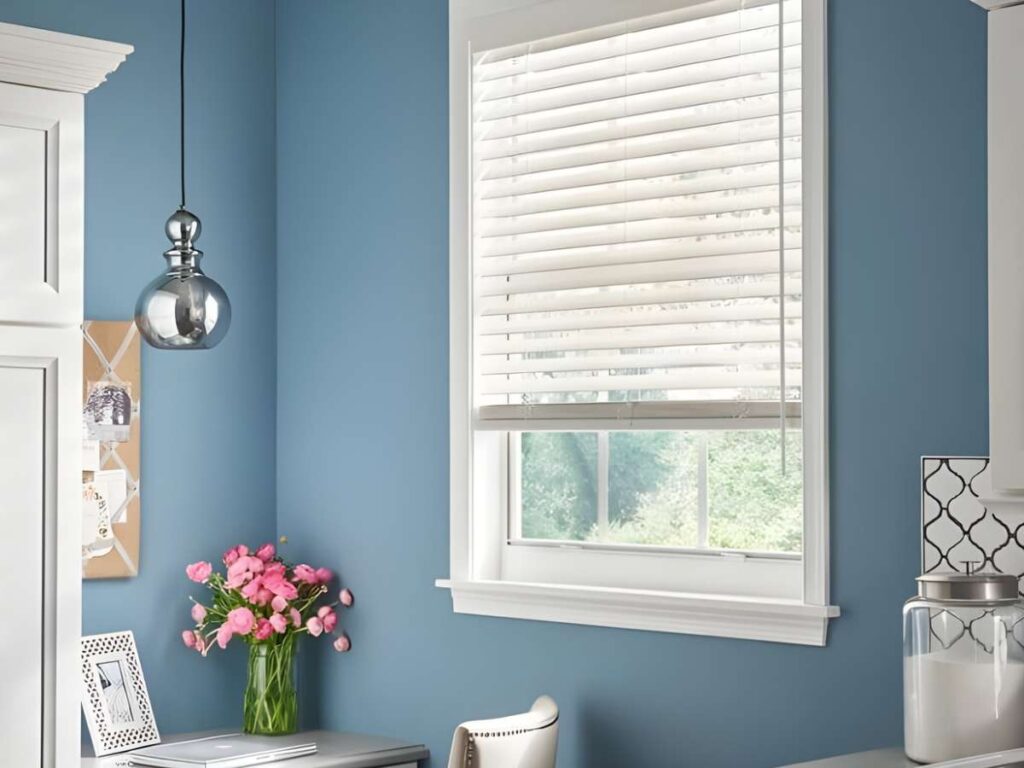 white alta faux wood blinds in a blue themed bathroom