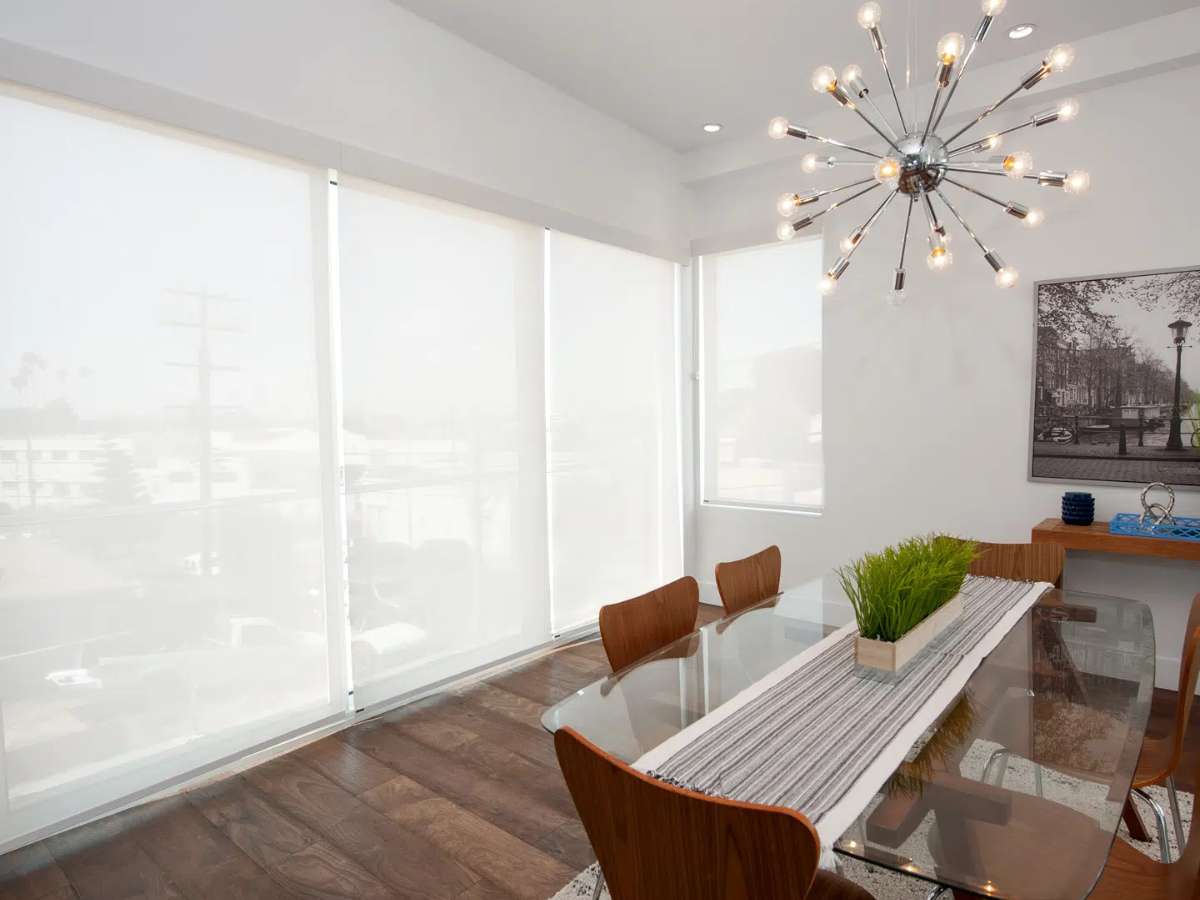 norman roller shades in a dining room