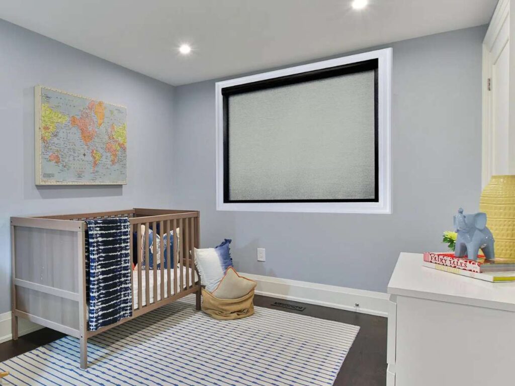 Norman Roller Shades in a bedroom