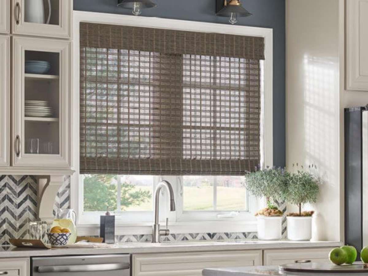 alta woven wood shades over a kitchen sink