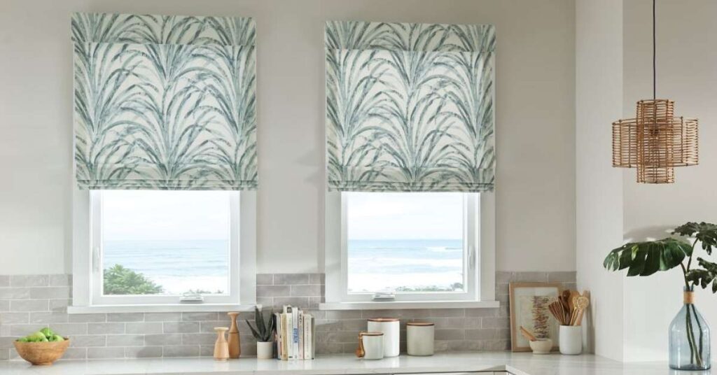Horizons Leaf Patterned Roman Shades in Kitchen Windows