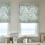 Horizons Leaf Patterned Roman Shades in Kitchen Windows