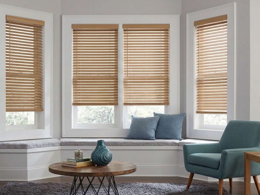 This is a photo of a wood blinds for bay windows, living room nook